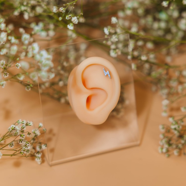 Tytanowy złoty labret z błyskawicą i cyrkoniami